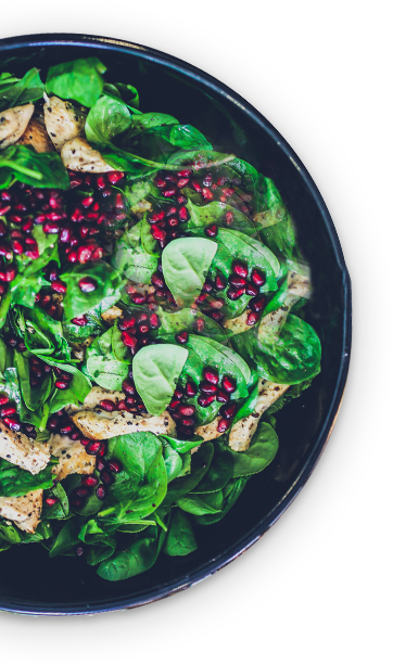 Chicken spinach salad with pomegranate seeds